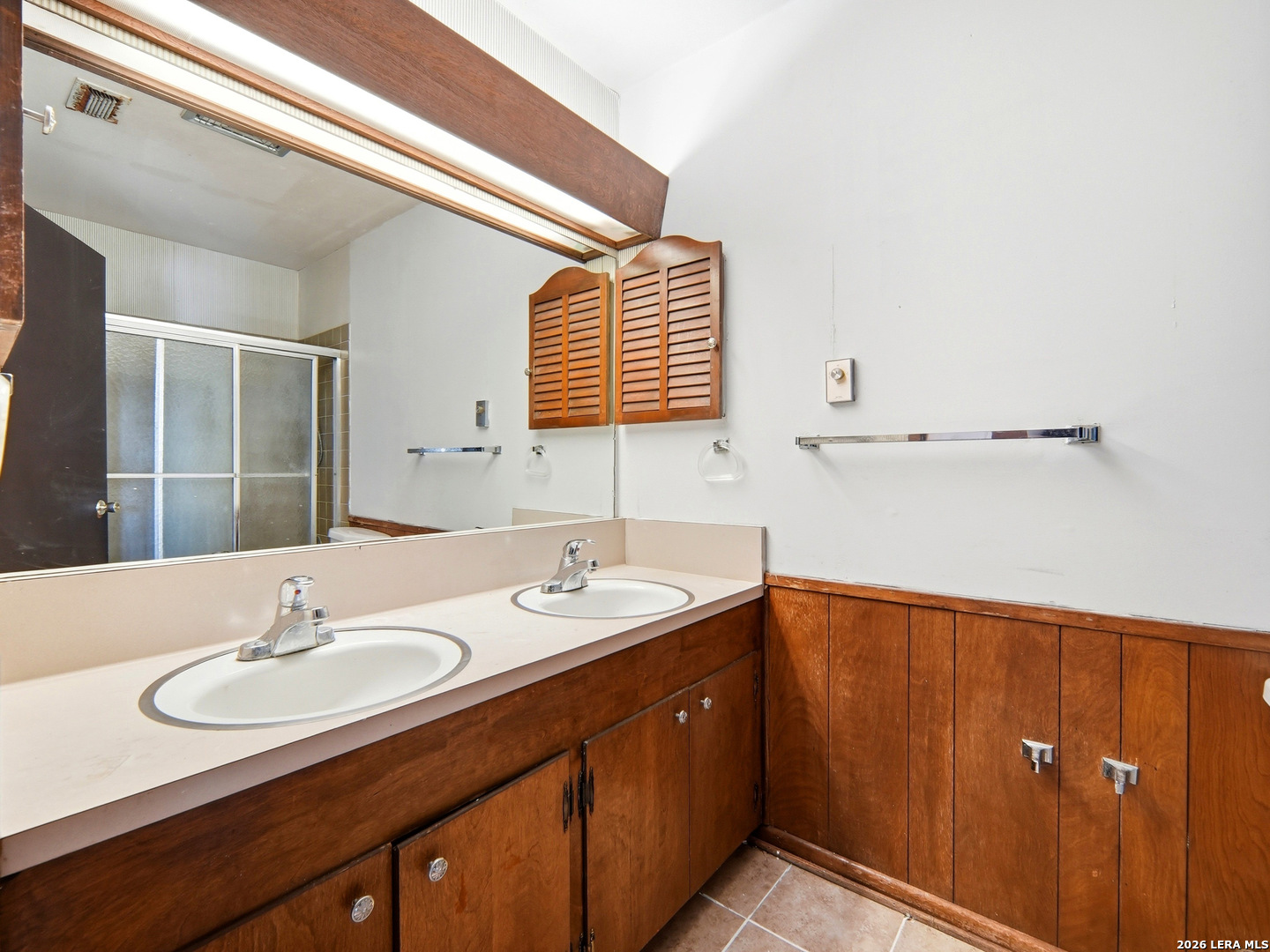 300 Ave M Hondo, TX 78861 - Photo 28 of 37 a bathroom with a sink and a mirror