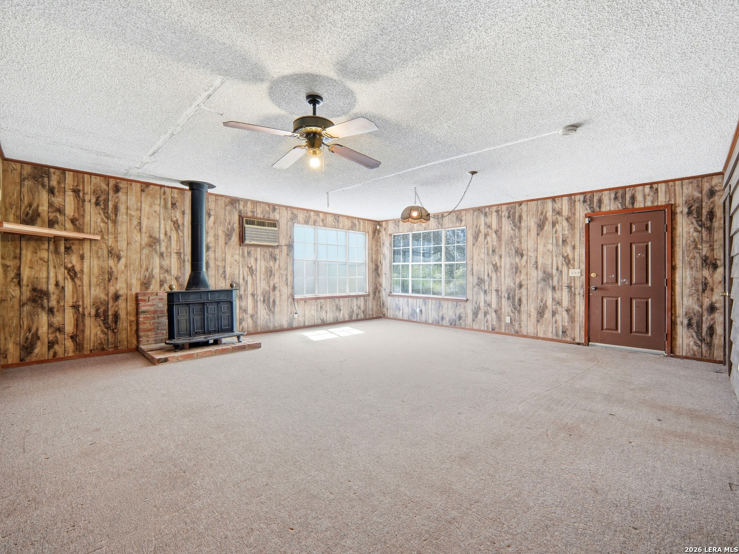 300 Ave M Hondo, TX 78861 - Photo 31 of 37 a view of a livingroom with furniture ceiling fan and windows