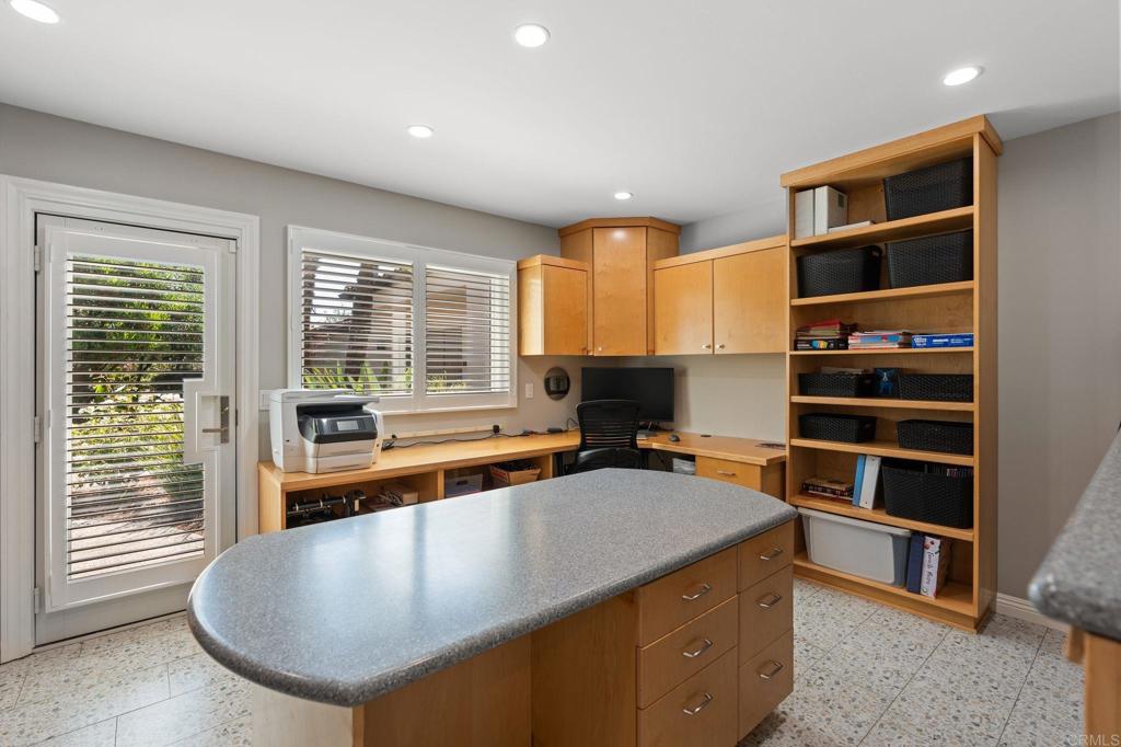 1229 Caminito Graciela Encinitas, CA 92024 - Photo 24 of 34 a kitchen with stainless steel appliances granite countertop a sink and a stove