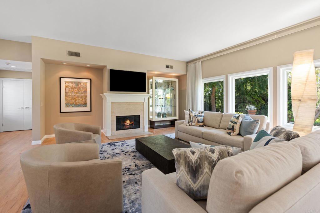 1229 Caminito Graciela Encinitas, CA 92024 - Photo 7 of 34 a living room with furniture fireplace and window