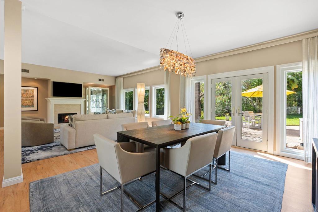 1229 Caminito Graciela Encinitas, CA 92024 - Photo 8 of 34 a view of a dining room with furniture window and wooden floor
