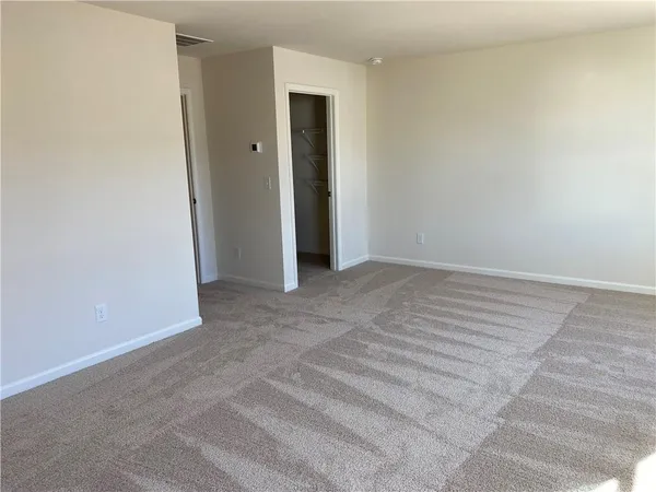 an empty room with a natural light