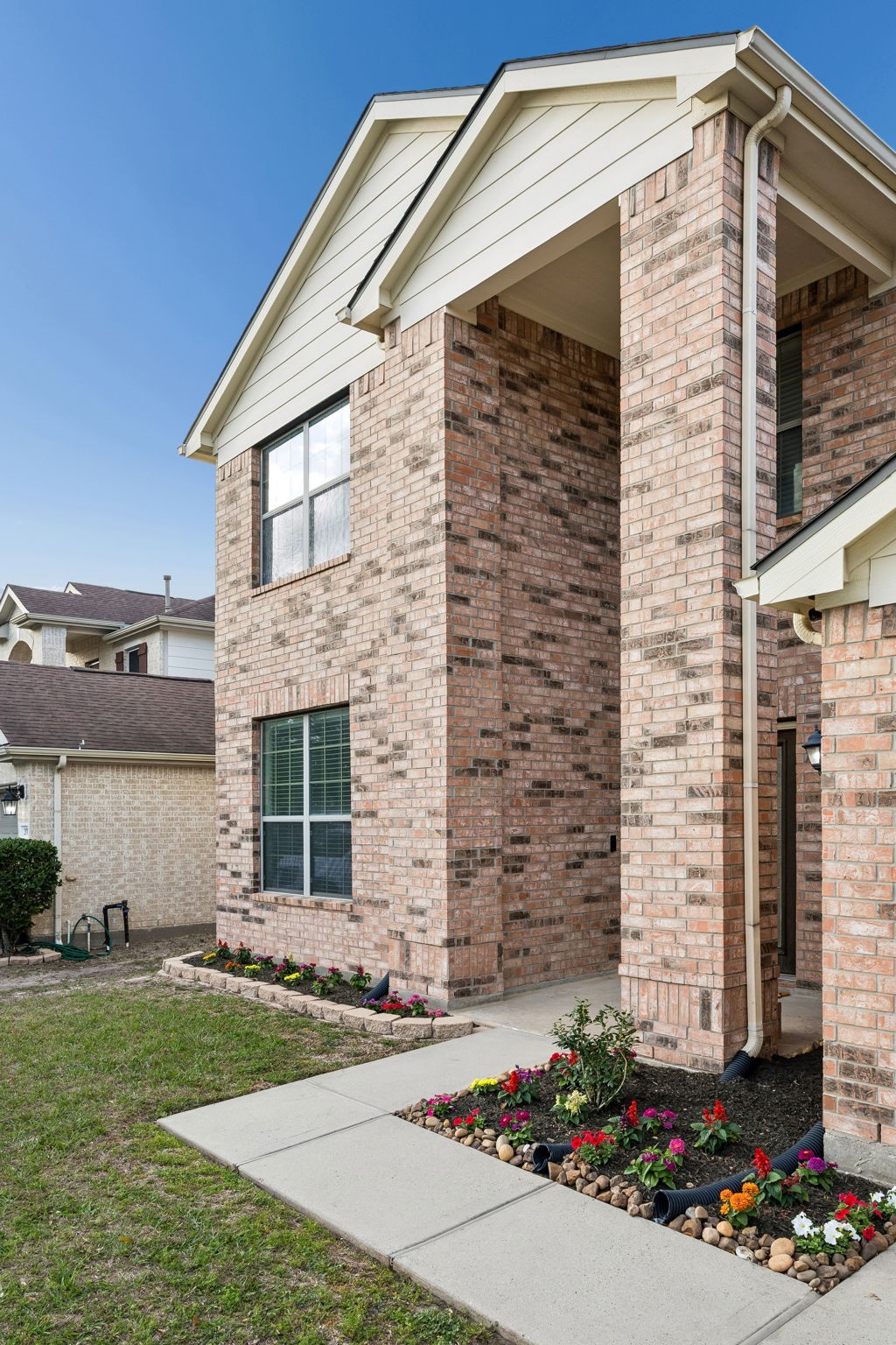 29711 Legends Green Drive Spring, TX 77386 - Photo 2 of 28 a front view of a house with a garden
