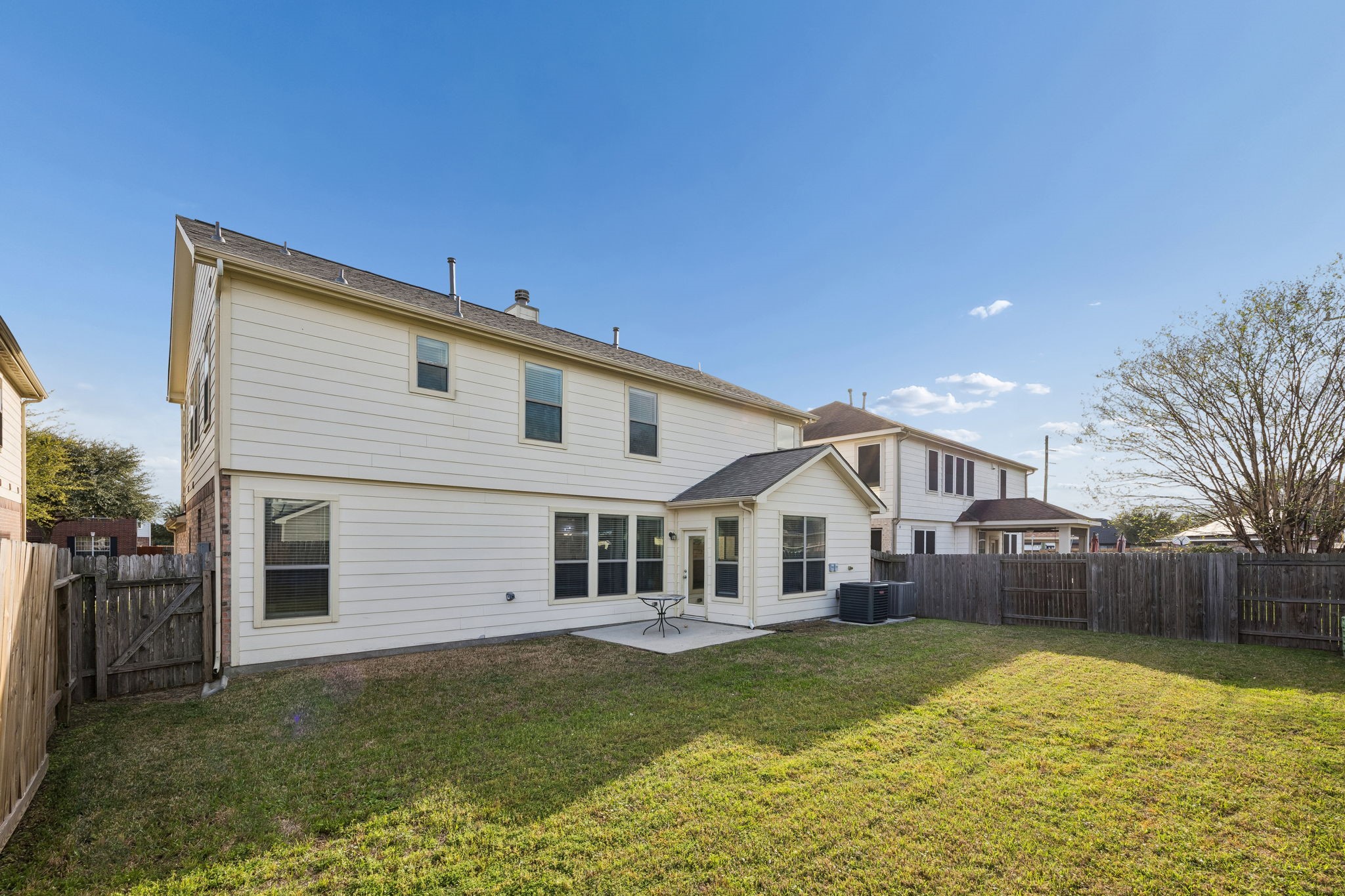 29711 Legends Green Drive Spring, TX 77386 - Photo 26 of 28 a view of a white house with a yard