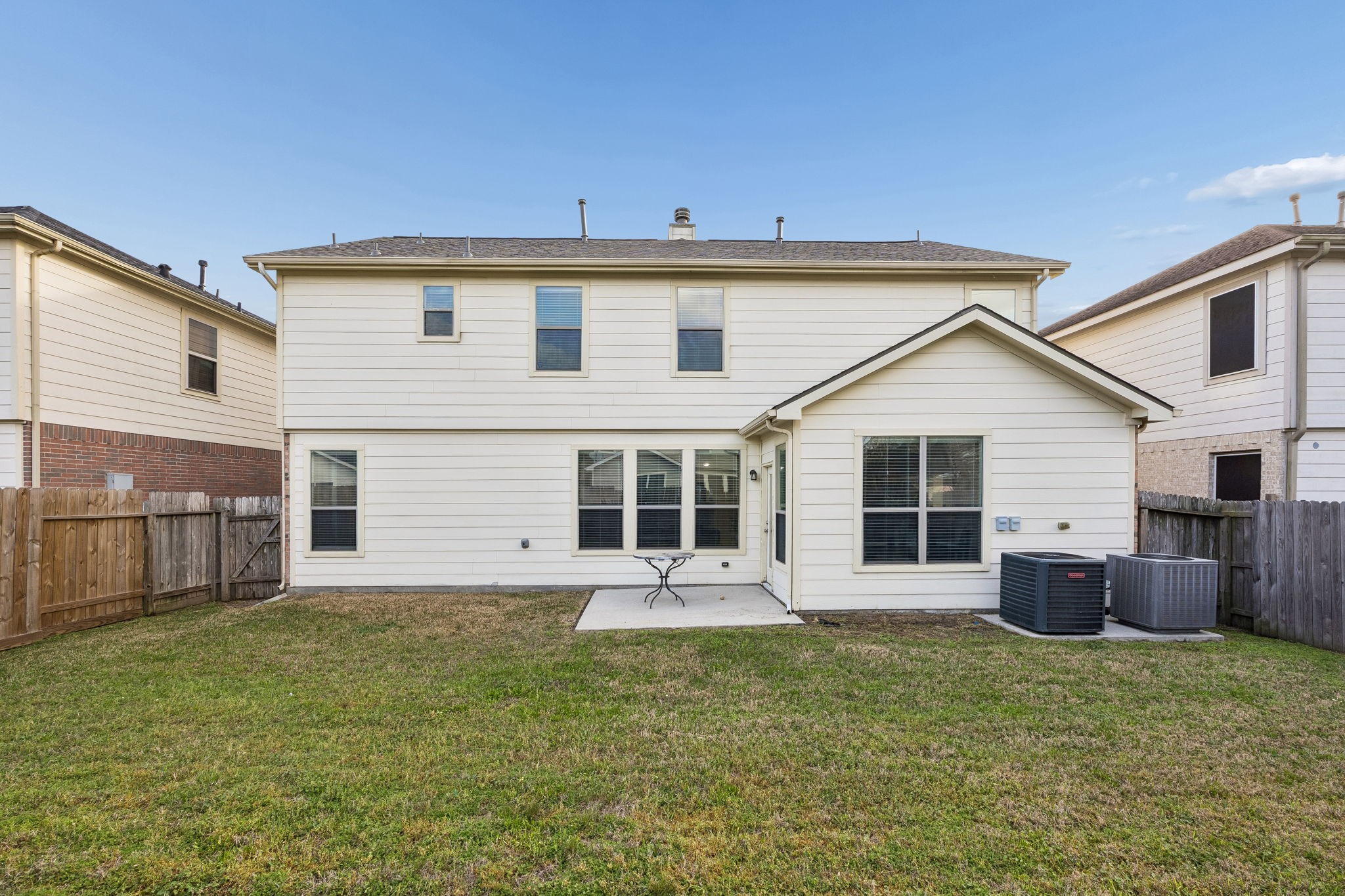 29711 Legends Green Drive Spring, TX 77386 - Photo 27 of 28 a view of a house with a backyard and a large window