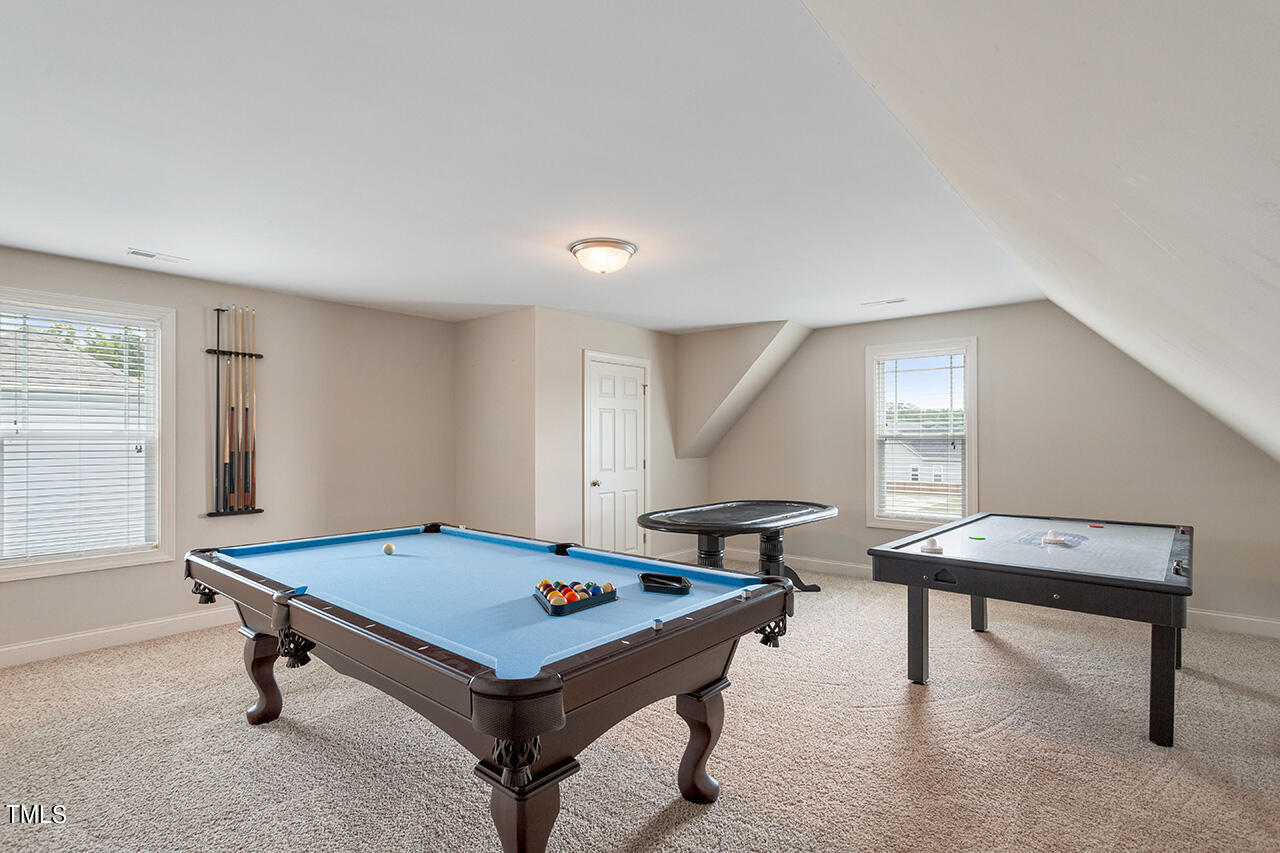 116 Celestial Drive Garner, NC 27529 - Photo 19 of 23 a room with furniture pool table and windows