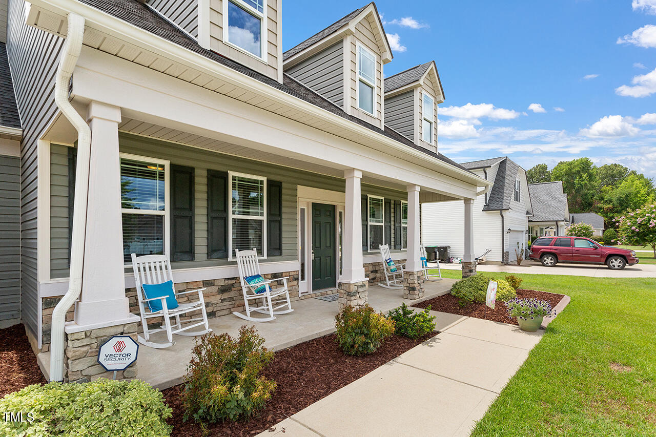 116 Celestial Drive Garner, NC 27529 - Photo 2 of 23 front view of a house with a patio