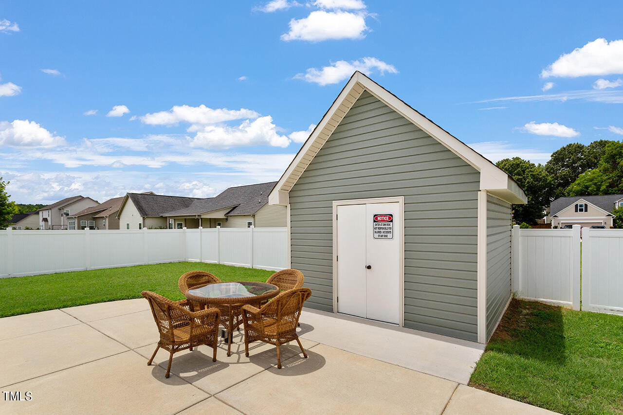 116 Celestial Drive Garner, NC 27529 - Photo 22 of 23 a view of backyard with seating space