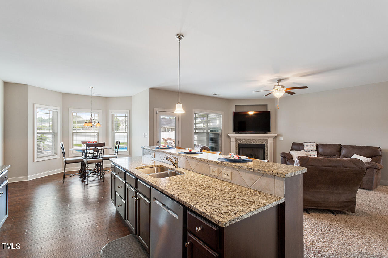 116 Celestial Drive Garner, NC 27529 - Photo 9 of 23 a kitchen with counter top space and living room