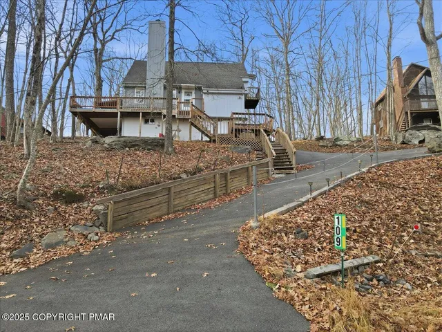 a view of house with outdoor space