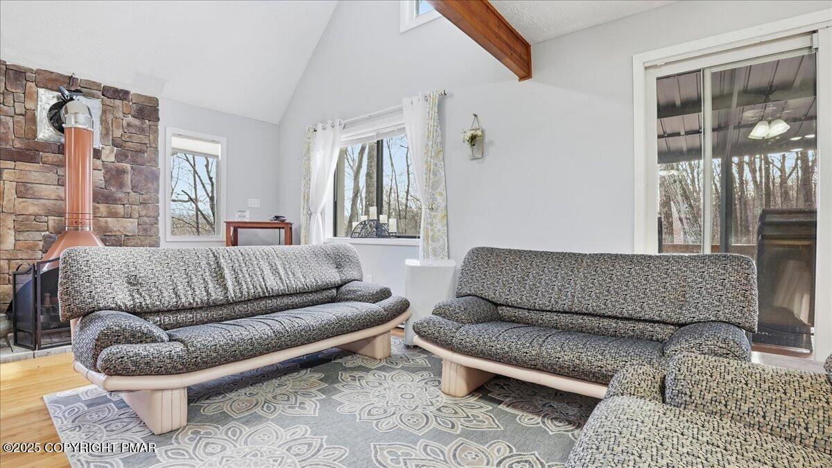 109 Saunders Drive Bushkill, PA 18324 - Photo 11 of 106 a living room with furniture and a window