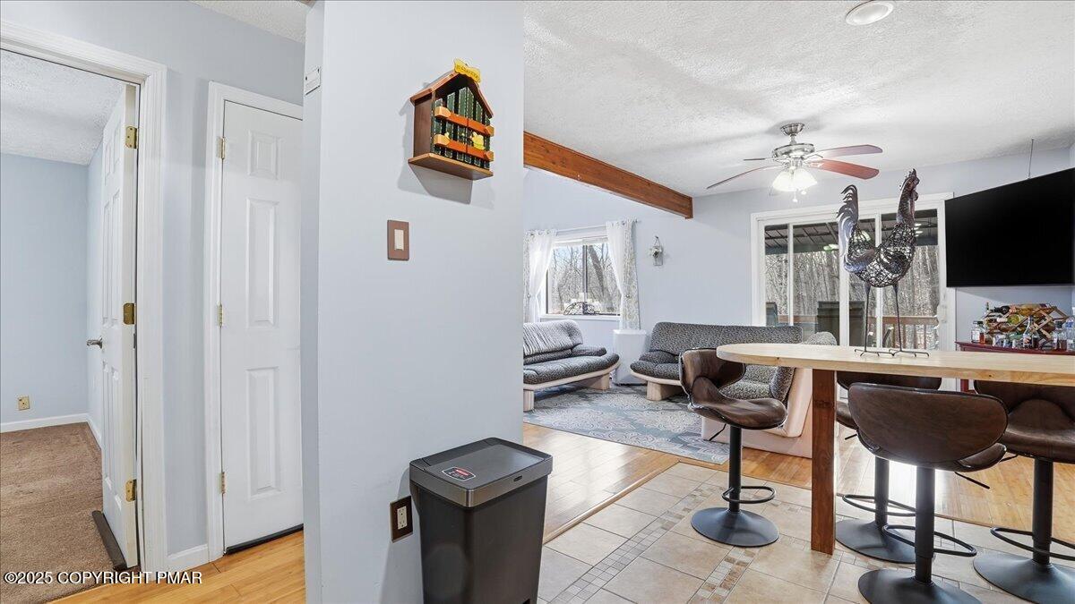 109 Saunders Drive Bushkill, PA 18324 - Photo 20 of 106 a view of a livingroom with furniture and a flat screen tv