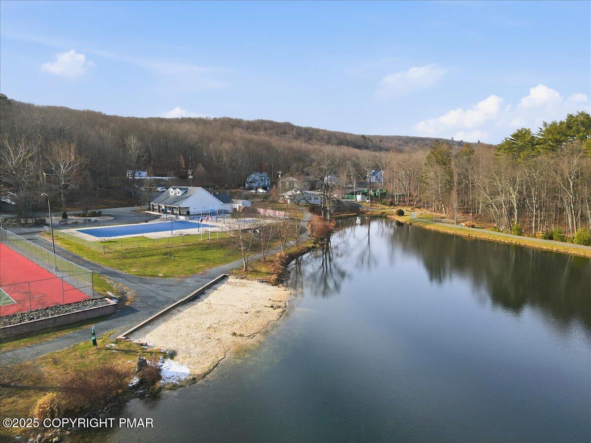 109 Saunders Drive Bushkill, PA 18324 - Photo 68 of 106 a view of a lake with a mountain