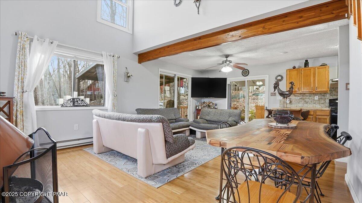 109 Saunders Drive Bushkill, PA 18324 - Photo 7 of 106 a living room with fireplace furniture and a flat screen tv