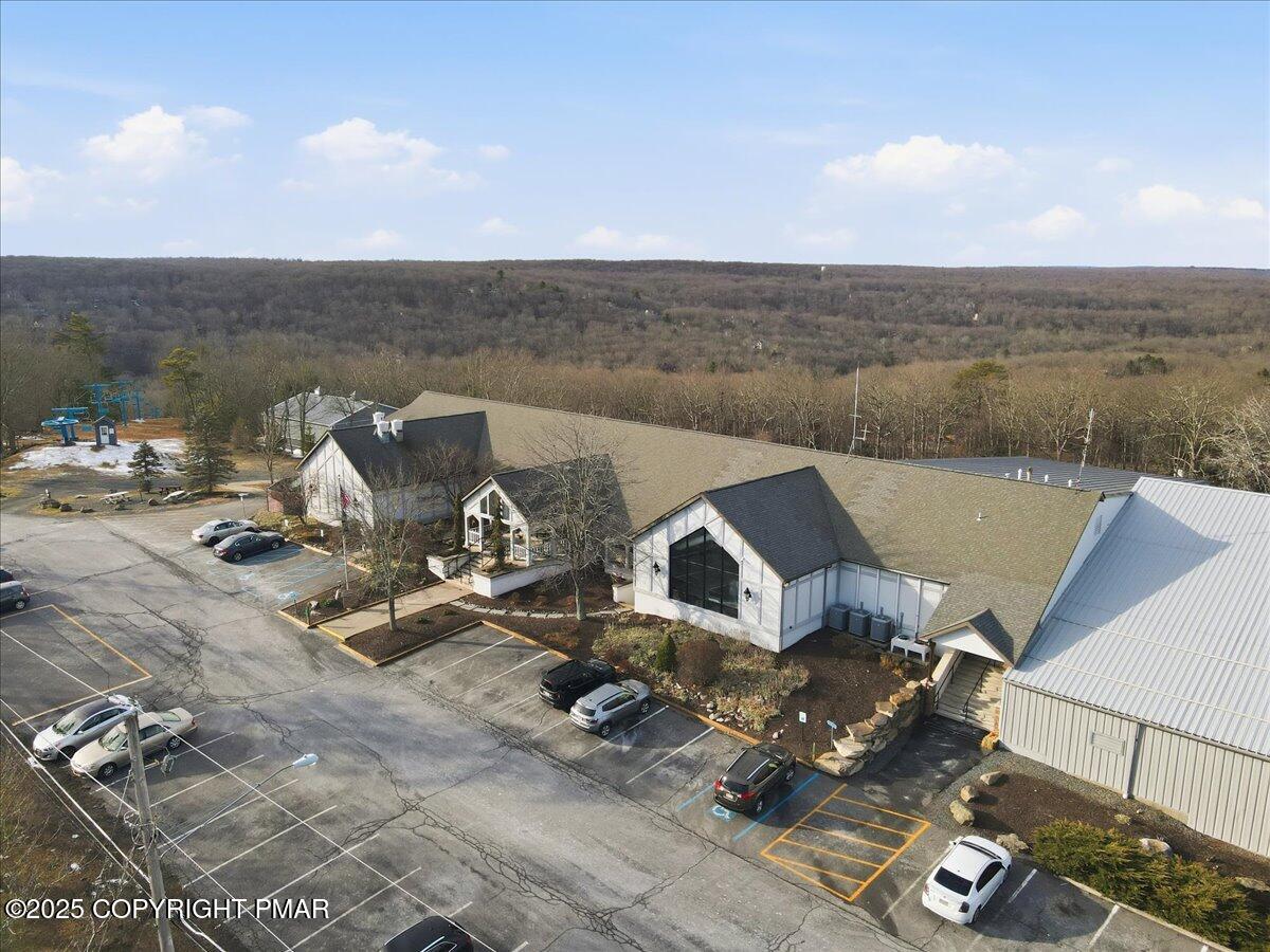 109 Saunders Drive Bushkill, PA 18324 - Photo 91 of 106 an aerial view of a house with pool table and chairs