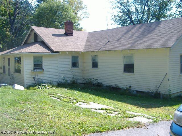 27 Mid Valley Road Lake Ariel, PA 18436 - Photo 6 of 6 a view of a house with a yard