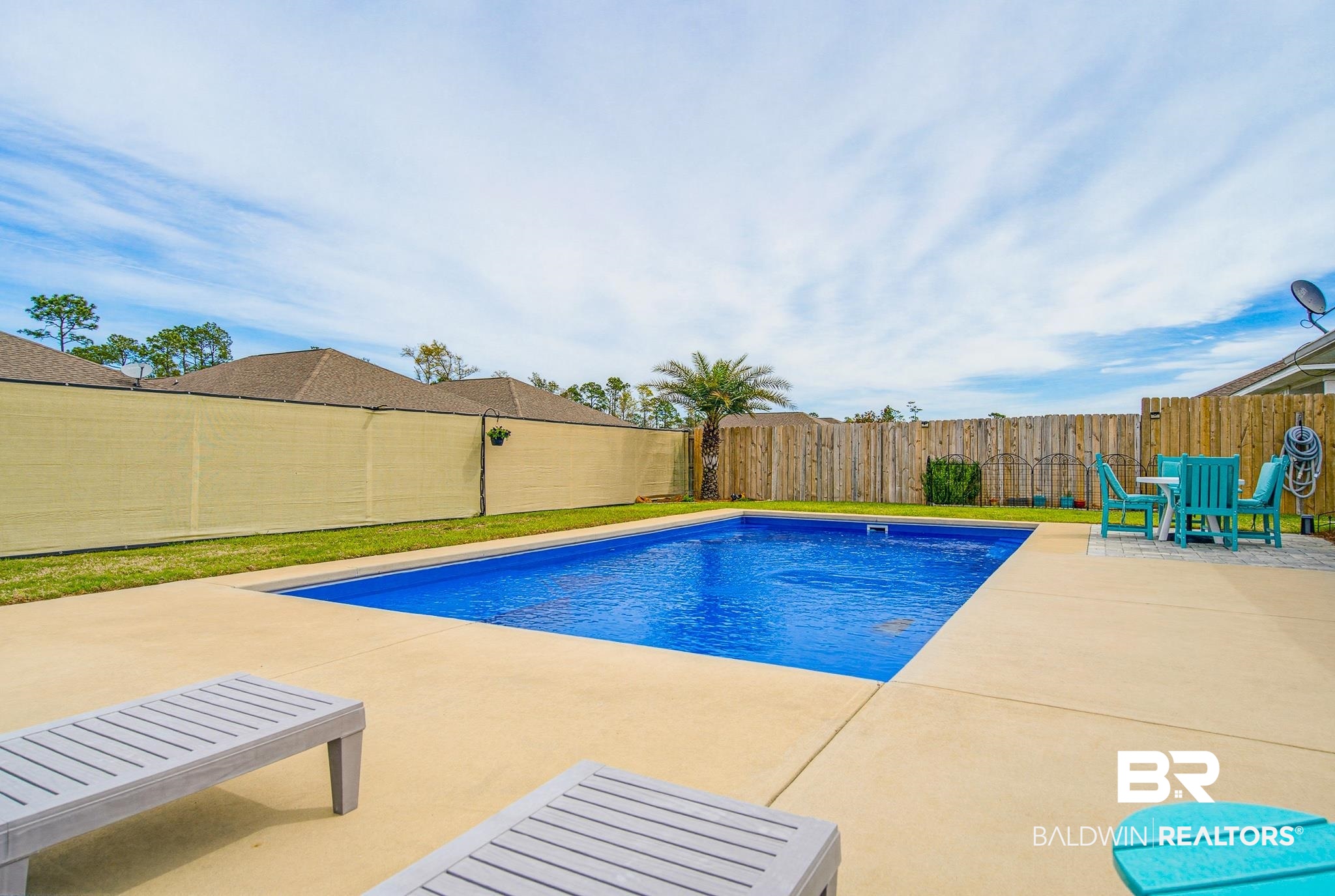 261 Fulham Lane Foley, AL 36535 - Photo 49 of 50 View of swimming pool featuring a fenced backyard and patio surround