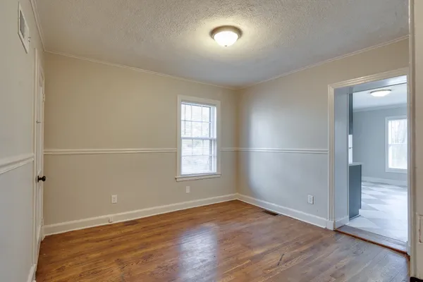 a kitchen with stainless steel appliances granite countertop a refrigerator sink and stove