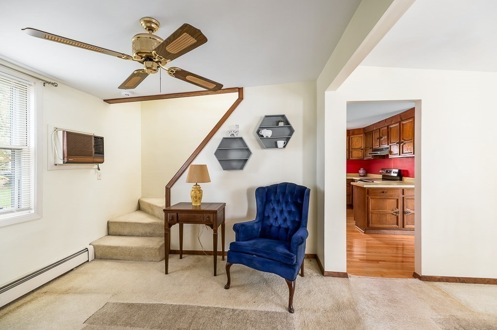 38 Matthies Street Beverly, MA 01915 - Photo 12 of 22 a living room with furniture and a flat screen tv