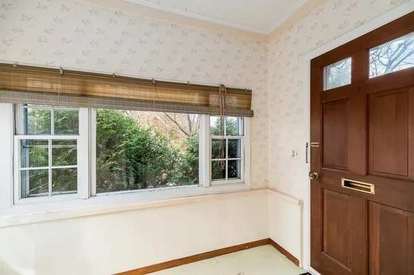 a view of a door and a window