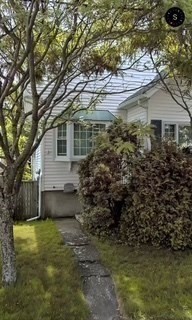 38 Matthies Street Beverly, MA 01915 - Photo 4 of 22 a view of a house with a yard