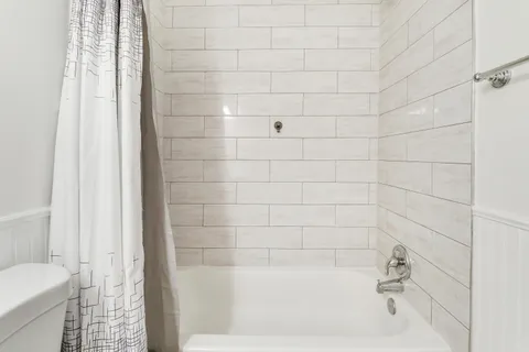 a bathroom with a bathtub