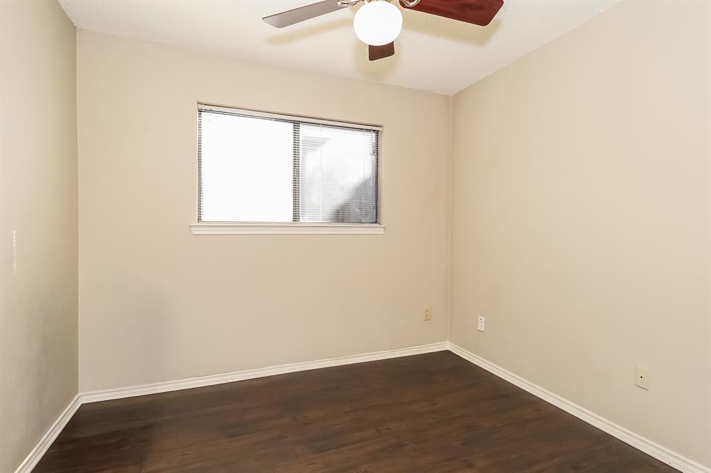 6308 Winton Street Dallas, TX 75214 - Photo 12 of 17 an empty room with a window