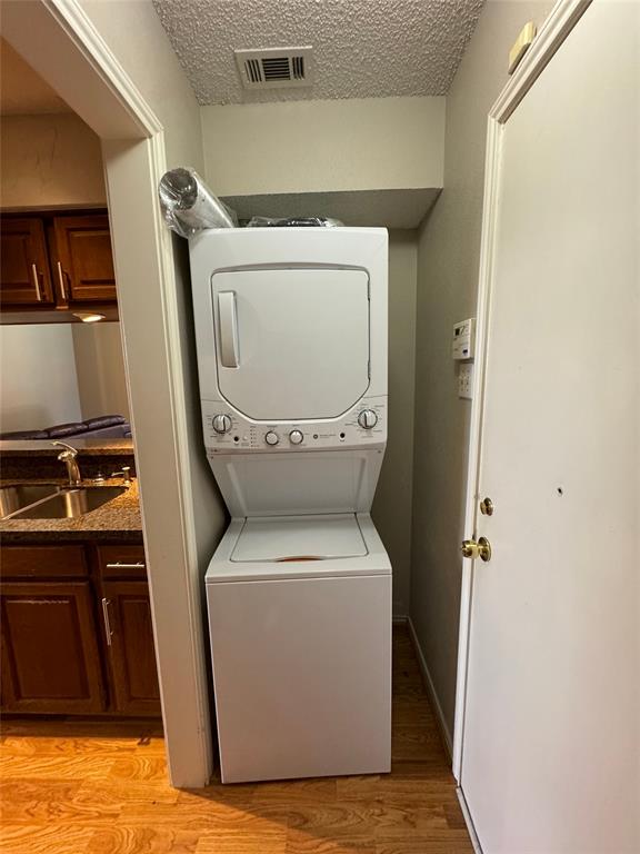 6308 Winton Street Dallas, TX 75214 - Photo 15 of 17 a utility room with dryer and washer