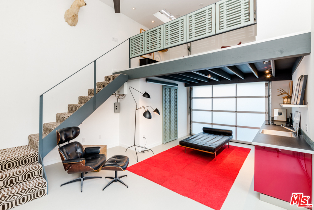 748 Palms Boulevard Venice, CA 90291 - Photo 15 of 17 a living room with furniture pool table and a window