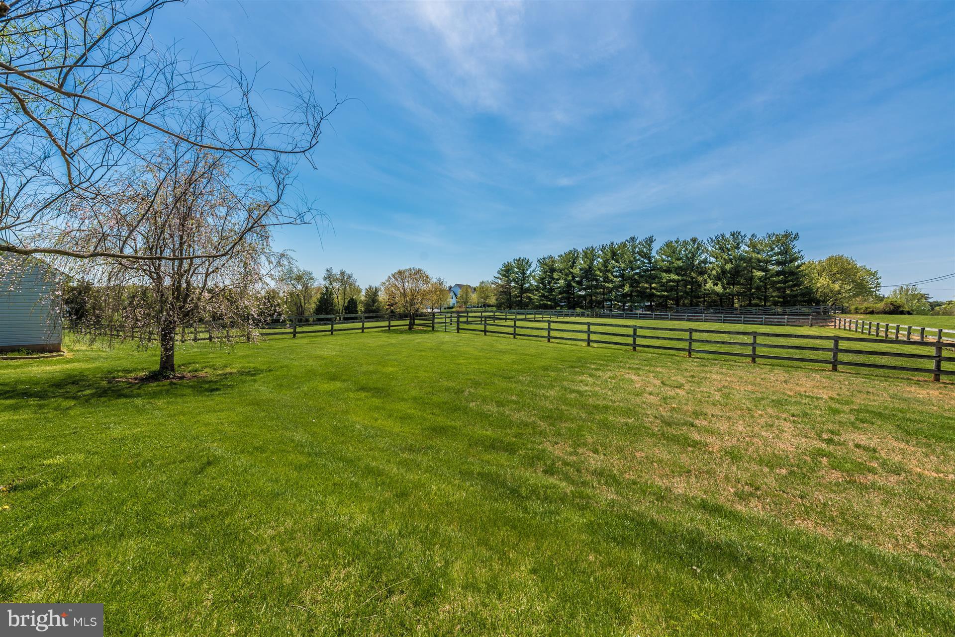 1210 Florence Road Mount Airy, MD 21771 - Photo 21 of 30 a view of a golf course with a lake