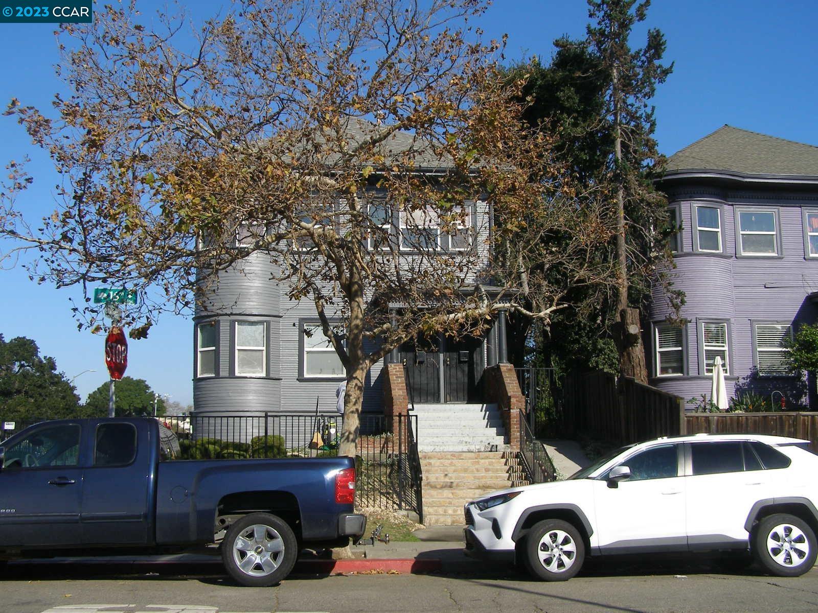 1128 16th Street Oakland, CA 94607 - Photo 2 of 26 a car parked in front of a house