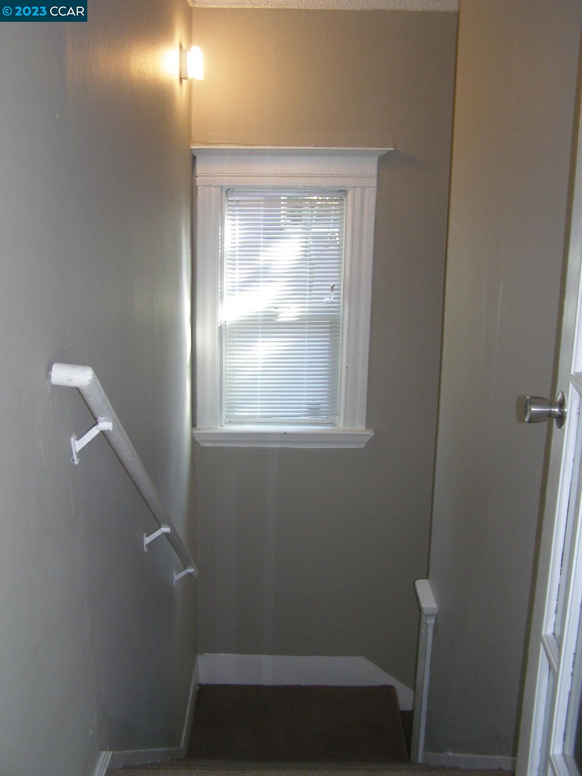 1128 16th Street Oakland, CA 94607 - Photo 5 of 26 a bathroom with a window