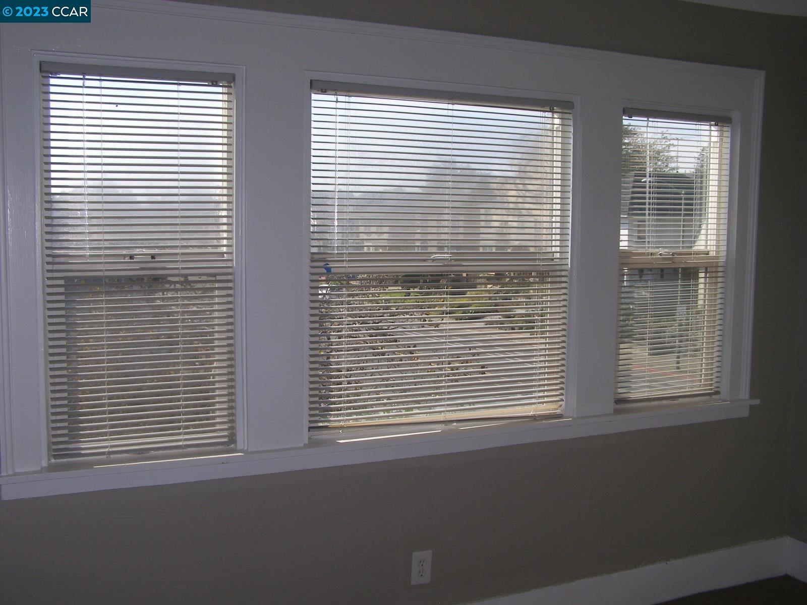 1128 16th Street Oakland, CA 94607 - Photo 10 of 26 a view of a room that has a window in it