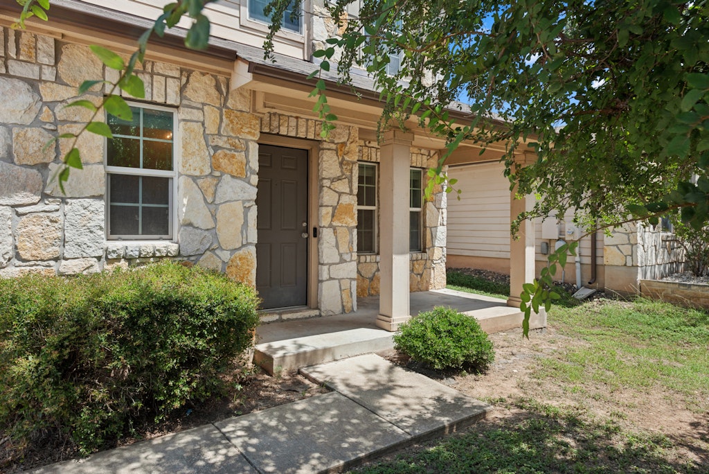 458 Nottingham Loop Kyle, TX 78640 - Photo 2 of 38 front view of a house with a yard