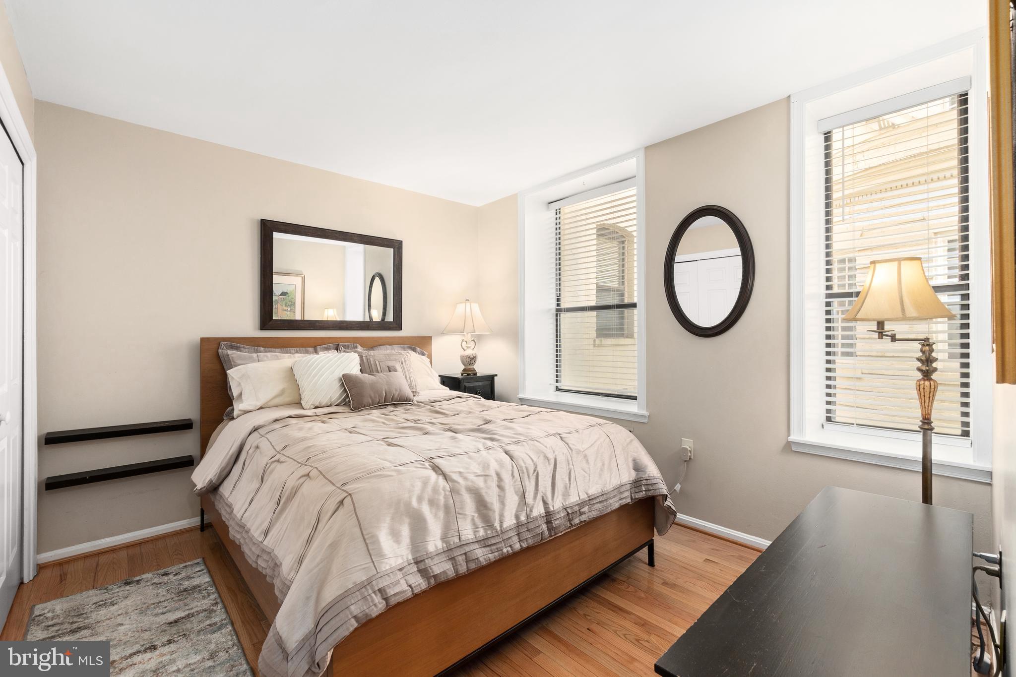 2145 California Street Northwest, Unit 102 Washington, DC 20008 - Photo 4 of 21 a bedroom with a bed and a window