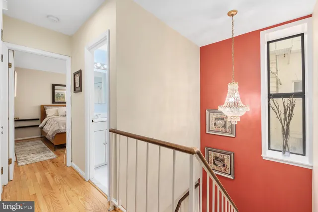 a view of a bedroom from a hallway