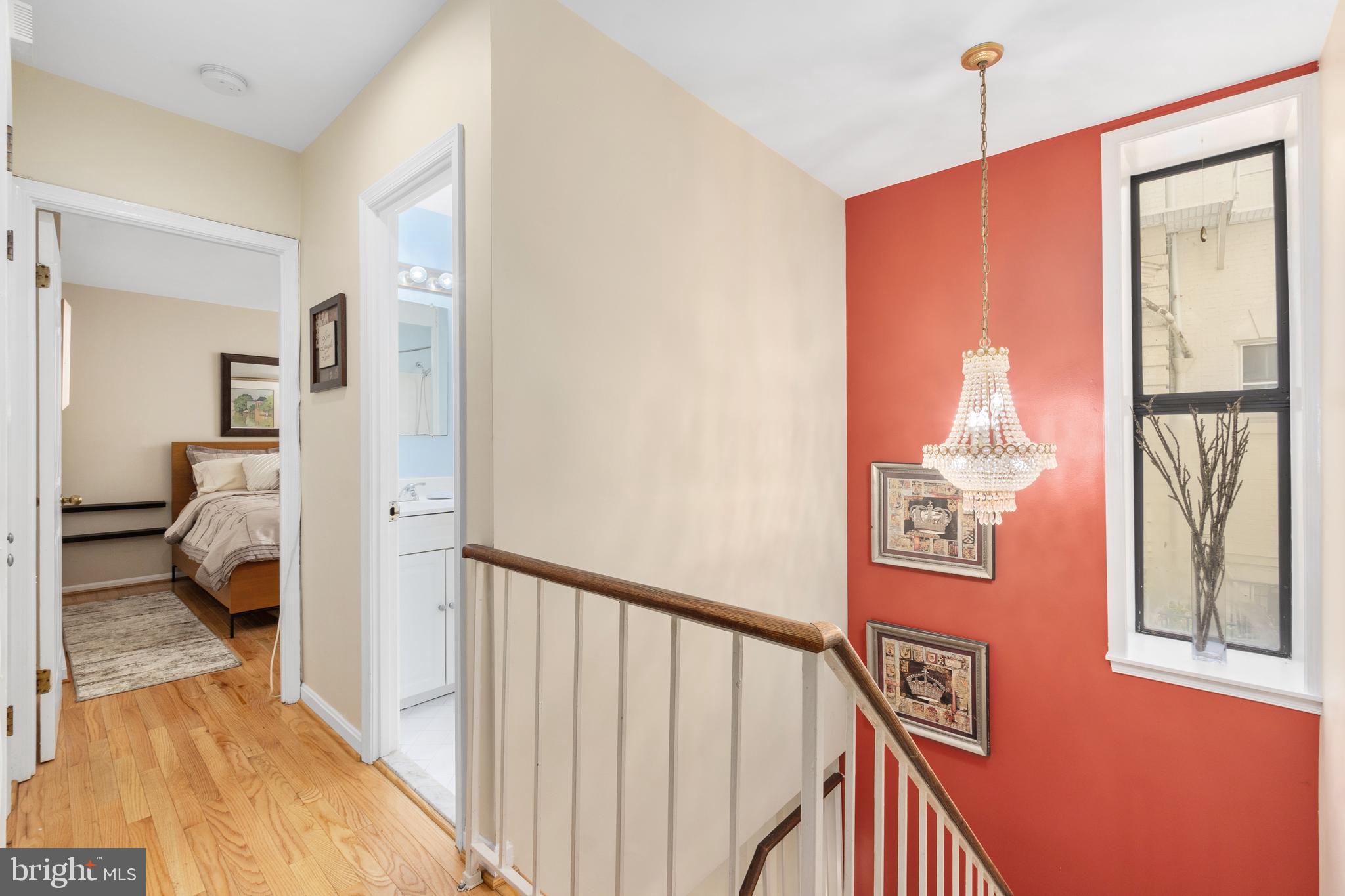 2145 California Street Northwest, Unit 102 Washington, DC 20008 - Photo 9 of 21 a view of a bedroom from a hallway