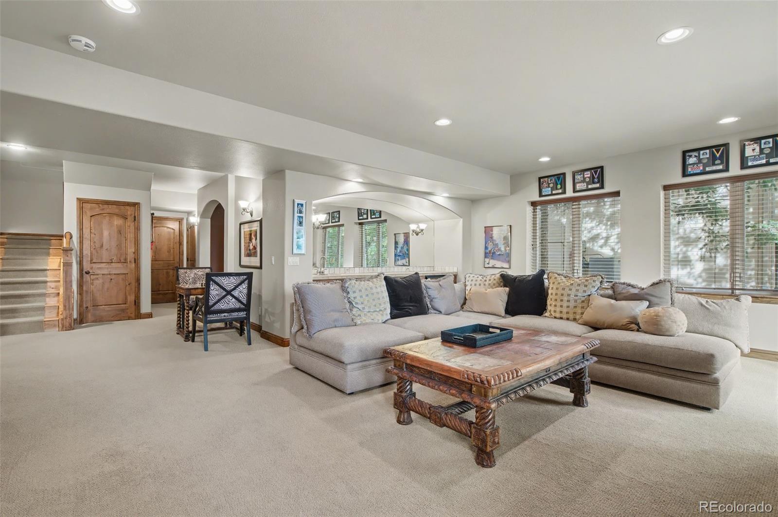 870 Mont Blanc View Colorado Springs, CO 80906 - Photo 26 of 42 a living room with furniture and a large window