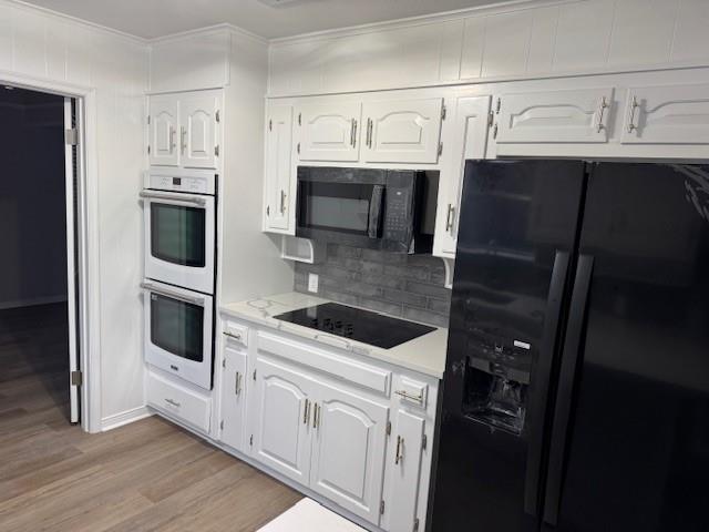 4713 Foxfire Way Fort Worth, TX 76133 - Photo 3 of 22 a kitchen with cabinets and steel stainless steel appliances