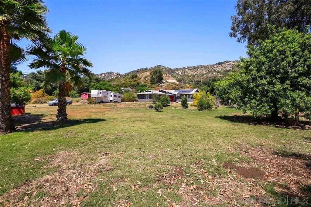 a view of yard with outdoor seating