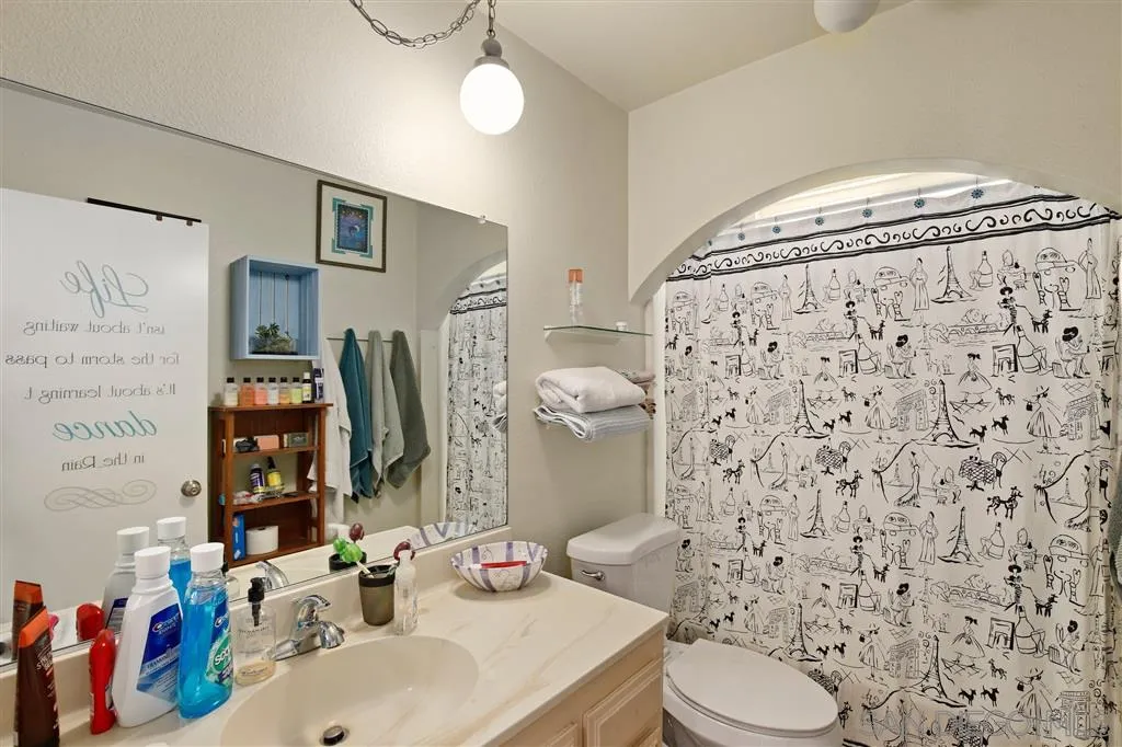 2465 Melru Lane Escondido, CA 92026 - Photo 15 of 25 a bathroom with a sink toilet and shower