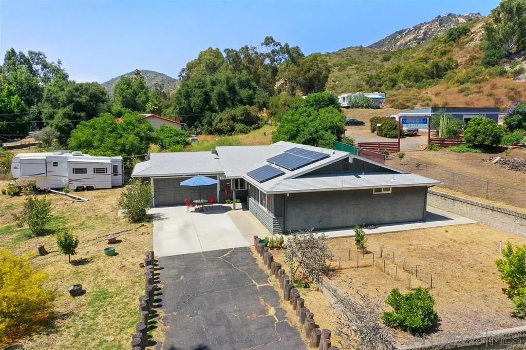 2465 Melru Lane Escondido, CA 92026 - Photo 22 of 25 an aerial view of a house with swimming pool and garden