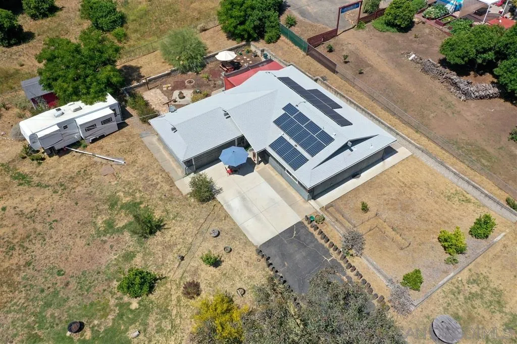 2465 Melru Lane Escondido, CA 92026 - Photo 23 of 25 an aerial view of a house with a yard