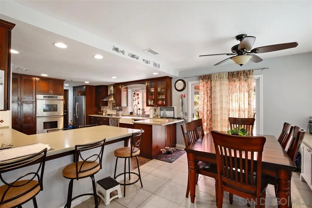 2465 Melru Lane Escondido, CA 92026 - Photo 6 of 25 a view of a dining room with furniture