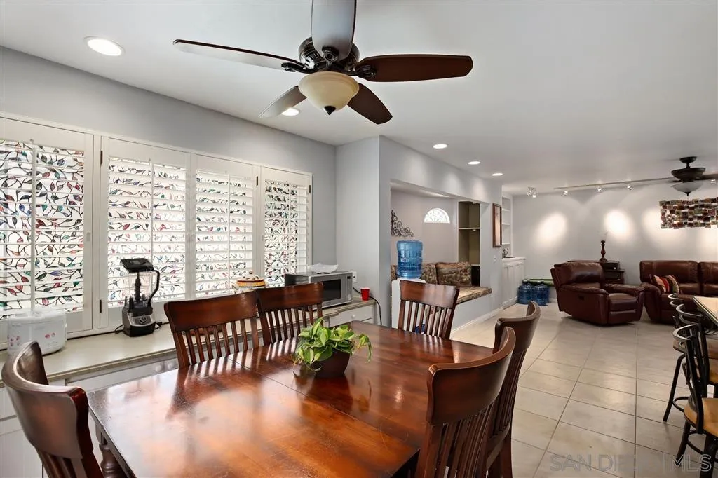 2465 Melru Lane Escondido, CA 92026 - Photo 8 of 25 a view of a dining room with furniture window and outside view