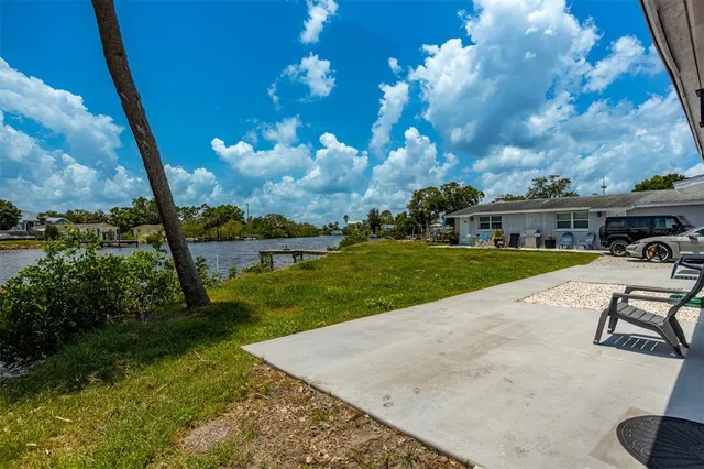 a view of a house with a big yard