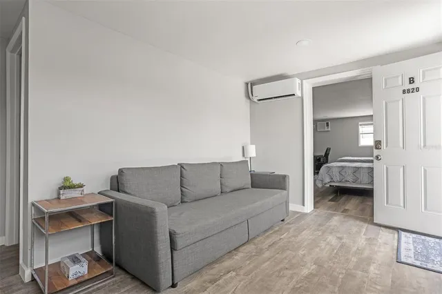 a kitchen with cabinets and white stainless steel appliances
