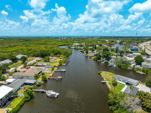 a view of a lake with houses