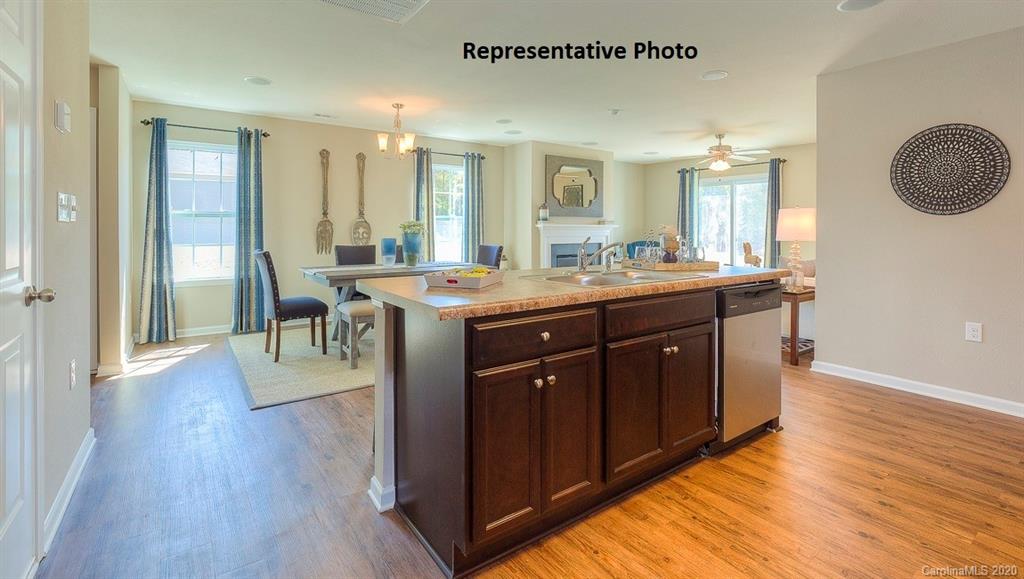 7261 Finnigan Road Charlotte, NC 28215 - Photo 16 of 40 a view of a kitchen counter space and wooden floor