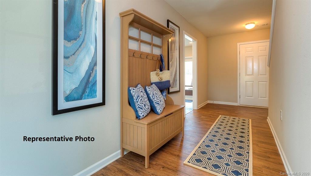 7261 Finnigan Road Charlotte, NC 28215 - Photo 3 of 40 a living room with furniture and a window